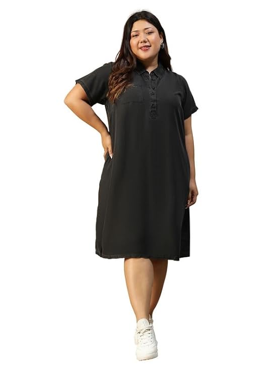 Black denim, bold curves, effortless style.