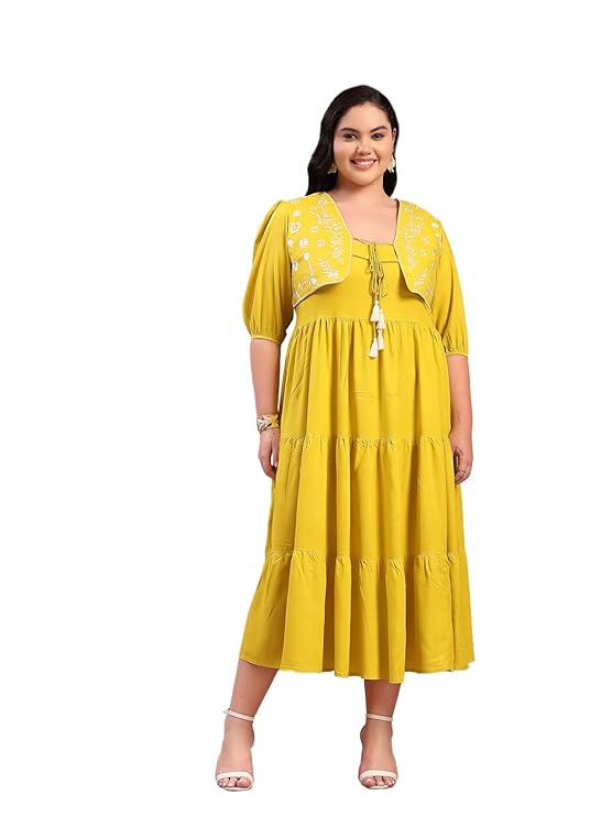 A tiered dress with jacket that turns everyday style up.